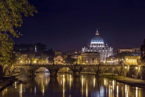 View of Ponte Vittorio Emanuele II and St. Peter's Basilica in evening, Rome