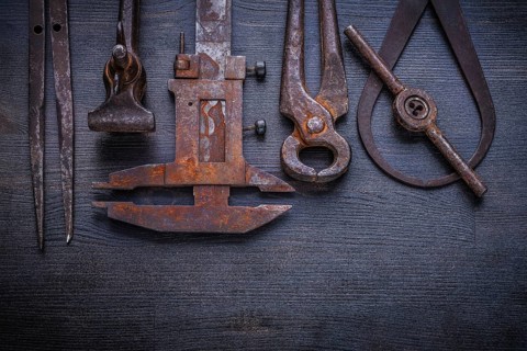 Set of old tools on vintage board
