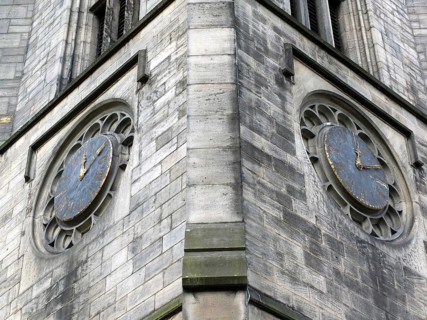 The tower of church of saint johns in leeds a seventeenth century church showing two old clocks