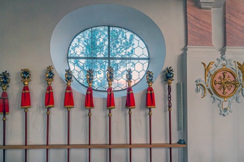 Processional poles in the rococo church of St Ulrich, affectionately known as -the little meadow-,