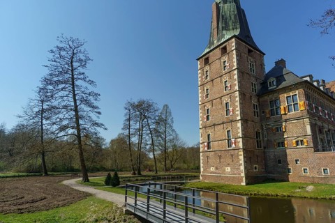 Historic castle with high tower, small bridges and water channels, raesfeld, münsterland, germany