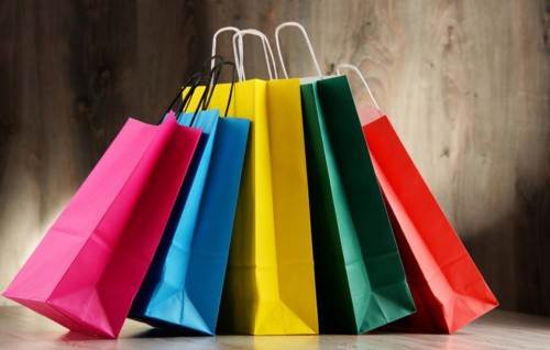 Composition with colorful paper shopping bags