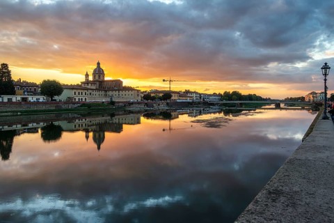 FLORENCE, TUSCANY/ITALY - OCTOBER 19 : View of buildings along the River Arno at dusk in Florence