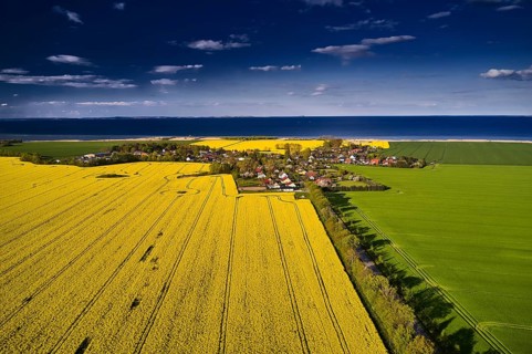 View of the Baltic Sea with the village of Wampen in the foreground