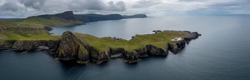 A panorama drone view of the Neist Point Lighthouse and the Minch on the western coast of Isle of