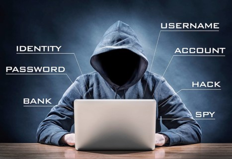 picture of an hacker on a laptop