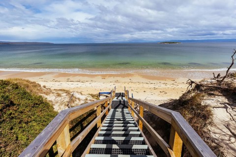 The iconic Hazards Beach during a warm spring day on the west side of the Freycinet Peninsula in