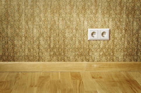 Double Socket In The Wall Of An Empty Room