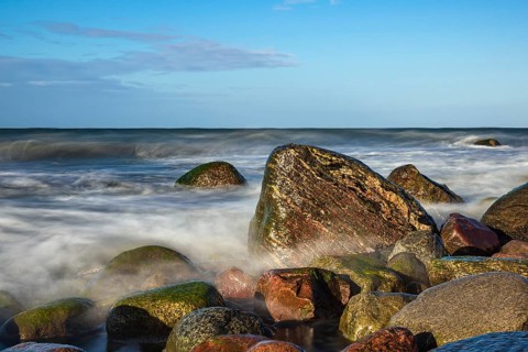 Stones on the Baltic Sea coast near Warnemünde on a stormy day