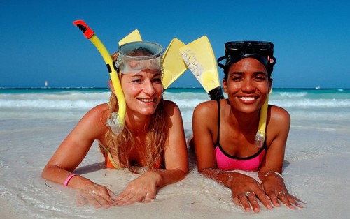 Two snorkellers on the beach, Punta Cana, Caribbean, Dominican Republic