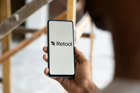 retool logo is displayed on smartphone. Retool is a fast way to build internal tool