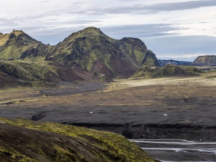 Moss-covered volcanic mountain landscape, Pakgil, Iceland