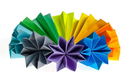 Colorful origami flower units isolated on white circle shared like rainbow