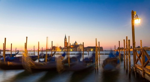 Gondolas at sunrise with San Giorgio di Maggiore church, Venice, Venezia, Italy