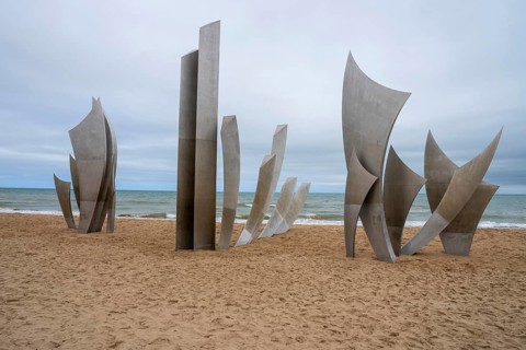 Les Braves, a striking monument on Omaha Beach, honors D-Day's heroes with three elements: Hope,