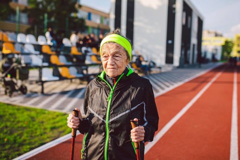 Active rest of the elderly theme. Sports and health in retirement. Caucasian very old woman with