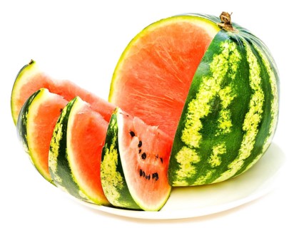 Watermelon With Slices At Plate Against The White Background Daugavpils, Latvia