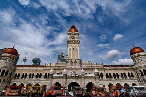 Tourists at Merdeka Square in Kuala Lumpur, Malaysia