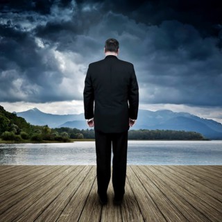 An image of a business man in bad weather