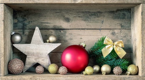 A typical Christmas symbols decoration on a wooden background