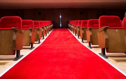 Red seats in a theater and opera