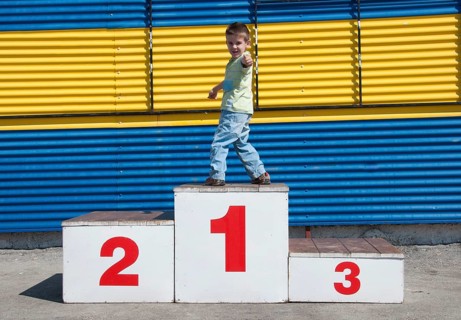 Little boy on the podium. First place