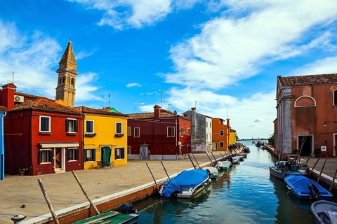Inclined tower - a landmark of the island of Burano. Burano is island of multi colored bright