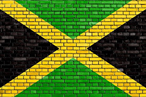Flag of Jamaica painted on brick wall