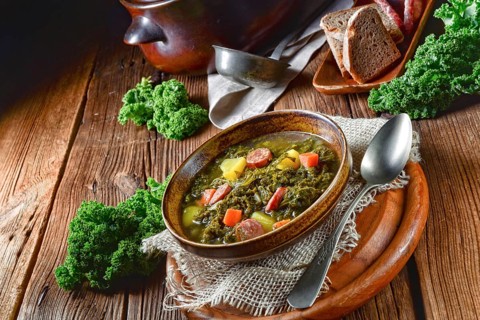 Rustic kale soup with meat and sausage