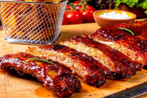 BBQ spare ribs from a charcoal grill