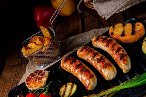 Delicious grilled sausage with various grilled vegetables