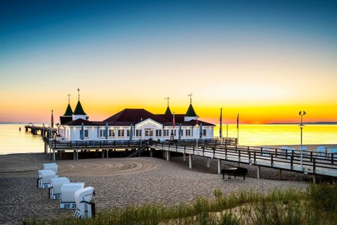 Sunrise on the pier in Ahlbeck on the island of Usedom on the Baltic Sea