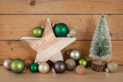 Christmas decoration glass balls with wooden star and fir tree