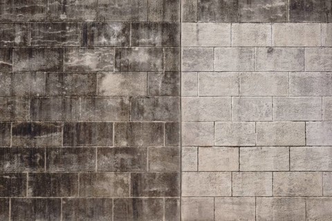 Weathering and water residue have washed out to form a striking pattern on a wall