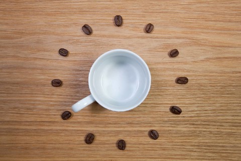 Coffee Time - Empty coffee cup and clock of coffee beans
