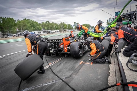 SANTINO FERRUCCI (14) of Woodbury, Connecticut comes down pit road for service during the XPEL