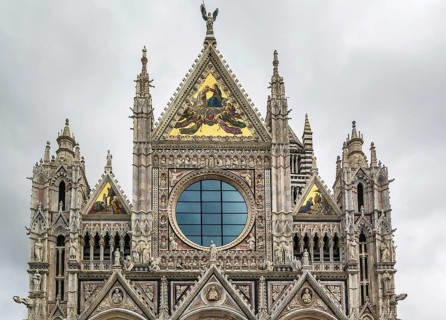 Main facade of Siena Cathedral (Duomo di Siena) is a medieval church in Siena, Italy. The cathedral