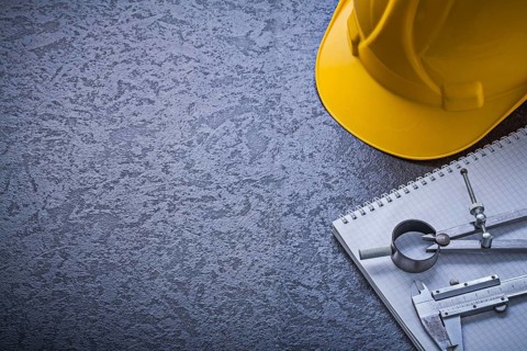 Notebook hard hat divider vernier scale copyspace construction concept
