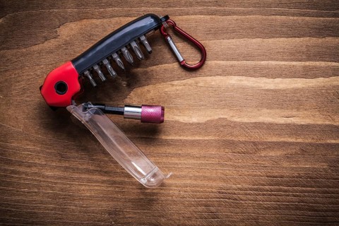 Replaceable screwdriver heads on wooden board construction concept