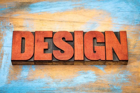 Design word typography - text in vintage letterpress wood type blocks against grunge wooden