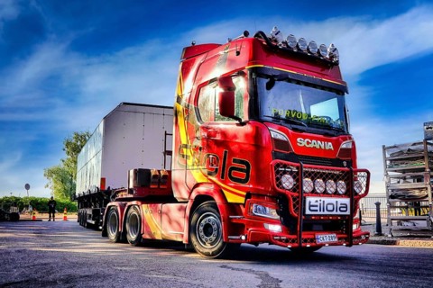 Red Next Generation Scania truck in front semi trailer of Eilola Logistics Oy, special transport.