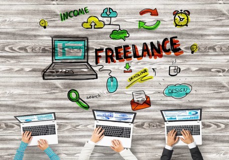Group of three people with devices in hands working together as symbol of networking and