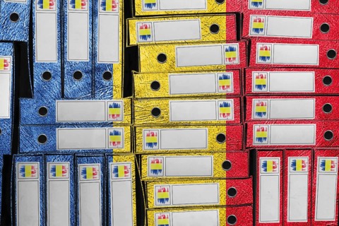 Romania Flag Colors Folder Stack, Bureaucracy and Government Administration Concep