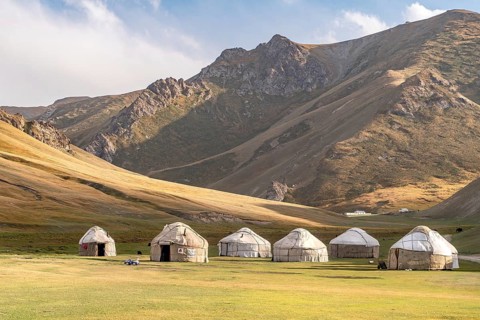 The view of yurts nomad village in Tash-Rabat in Kyrgyzstan