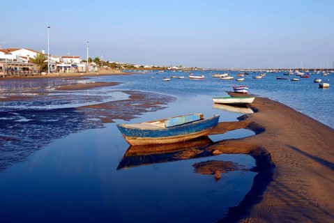 Boat on the Rio Piedras river, beach in El Rompido, Cartaya, Costa de la Luz, Huelva, Andalusia,