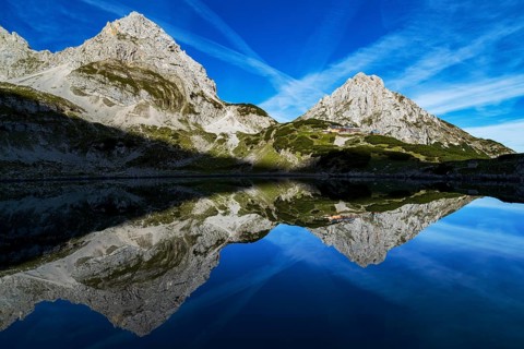 Panorama of the Drachensee, the Coburger Hütte and the Zugspitze in Tyrol, Austria, Alps