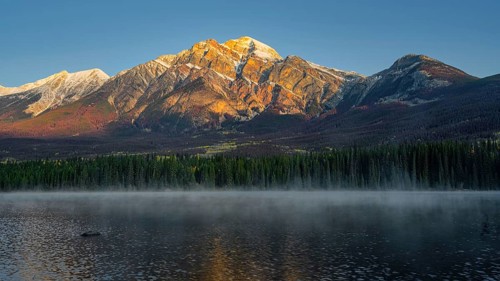 Beautiful autumn landscape scene in mountain in background in Jasper National Park west Canada with