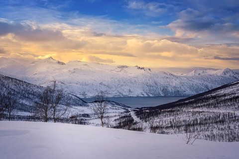 Beautiful winter landscape scene, sunset or sunrise in mountains and fjords