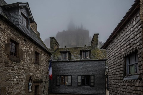 Mont-Saint-Michel, monastery hill, houses at the lower end of the Grande Rue above the abbey in the