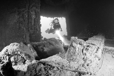 Diver finds teapot in the wreck of the HIJMS Nagato, Marshall Islands, Bikini Atoll, Micronesia,